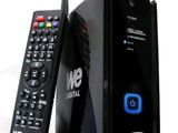 a remote control sitting next to a box with a remote