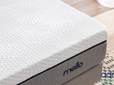 a close up of a mattress on a wooden floor
