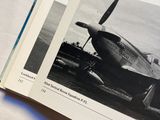 an open book with pictures of airplanes on it