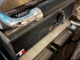 a close up of a stove with a pan on top of it