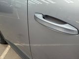 a close up of a door handle on a car