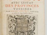 un vieux livre avec l'image d'un blason