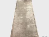 un gros plan d'un tapis sur fond blanc avec le chiffre 33