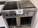 two stoves in the kitchen with a number 33 on them