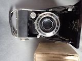 a camera that is sitting on top of a box