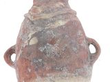 an old vase that is sitting on a white surface