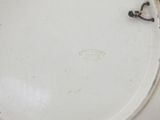 a white plate with a black and white design on it
