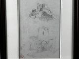 drawing of a castle in a black frame on a wall