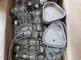 a cardboard box filled with assorted items in it