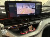 a picture of a car dashboard with a monitor on it