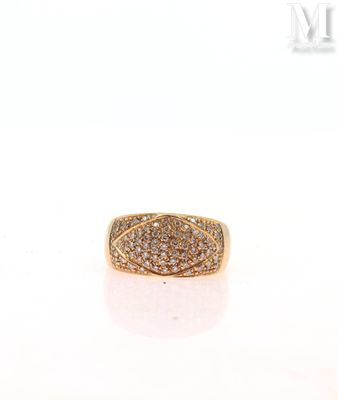 a yellow gold ring with diamonds on a white background
