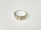 an image of a close up of a ring on a white surface