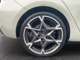 a close up of a car ' s wheel on the ground