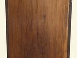 a small wooden cabinet with a drawer on top of it