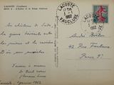 une vieille carte postale sur laquelle figure l'image d'un cheval