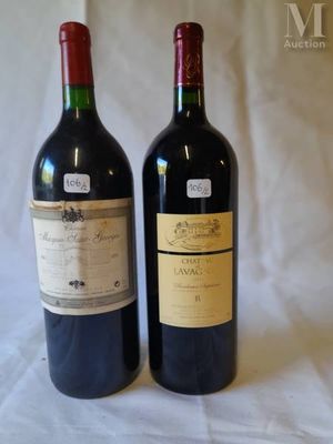 two bottles of wine sitting next to each other on a table