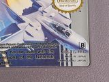 a card with a picture of a fighter jet on it