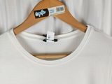 a white t - shirt with a picture of a bird on it