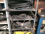 a bunch of wires that are on a shelf