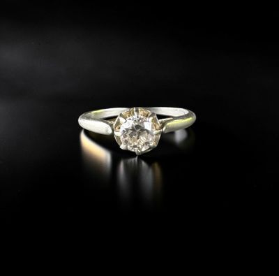 an engagement ring with a diamond in the center