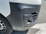 a close up of the front bumper of a van