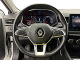 the interior of a car with a steering wheel and dashboard controls