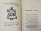 an open book with a picture of a coat of arms on it
