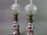 pair of antique chinese porcelain lamps with glass lampshads