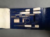 a picture of a set of tools in a blue case