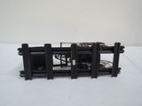 a small model of a train on a white table