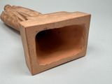 a clay object that is sitting on a table