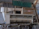 an image of a machine that is parked in a warehouse
