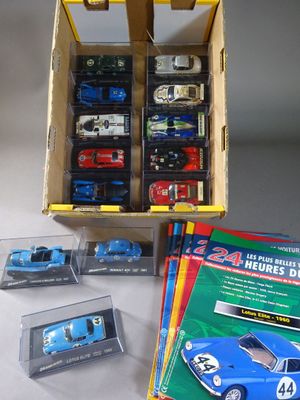 a box of assorted toy cars on a table