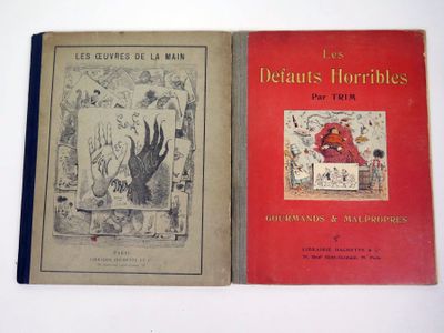 Deux livres sont posés sur une surface blanche : l'un est rouge et l'autre est noir.