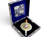 a box with a clock inside of it on a white surface