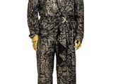 a mannequin wearing a black and white suit on a stand