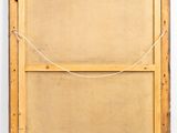 an old wooden frame with a rope hanging from it ' s side