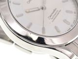 an image of a close up of a watch on a white surface