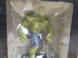 a toy in a box with a picture of the hulk