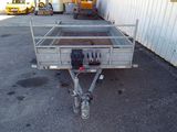 an image of a trailer parked in front of a building