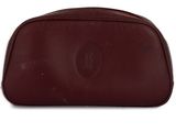 an image of a brown leather case sitting on top of a white surface