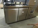 two ovens that are sitting on top of a counter