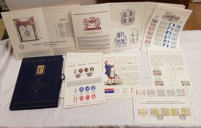 a table that has a bunch of books and a book on it