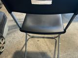 a chair that is sitting in front of a table