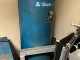 an image of a room with a blue tank and a blue machine