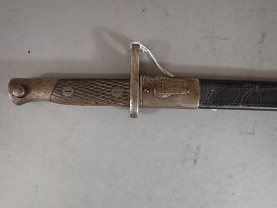 a knife that is laying on a table