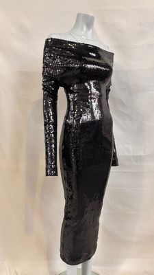 a black sequinized dress on a mannequin mannequin mannequin mannequin mannequin mannequin mannequin mannequin