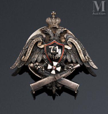 an image of a metal badge with two crossed swords and a shield with an eagle on it