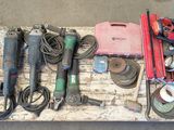 a lot of tools that are laying out on a table