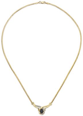 a gold necklace with a black and white stone pendant
